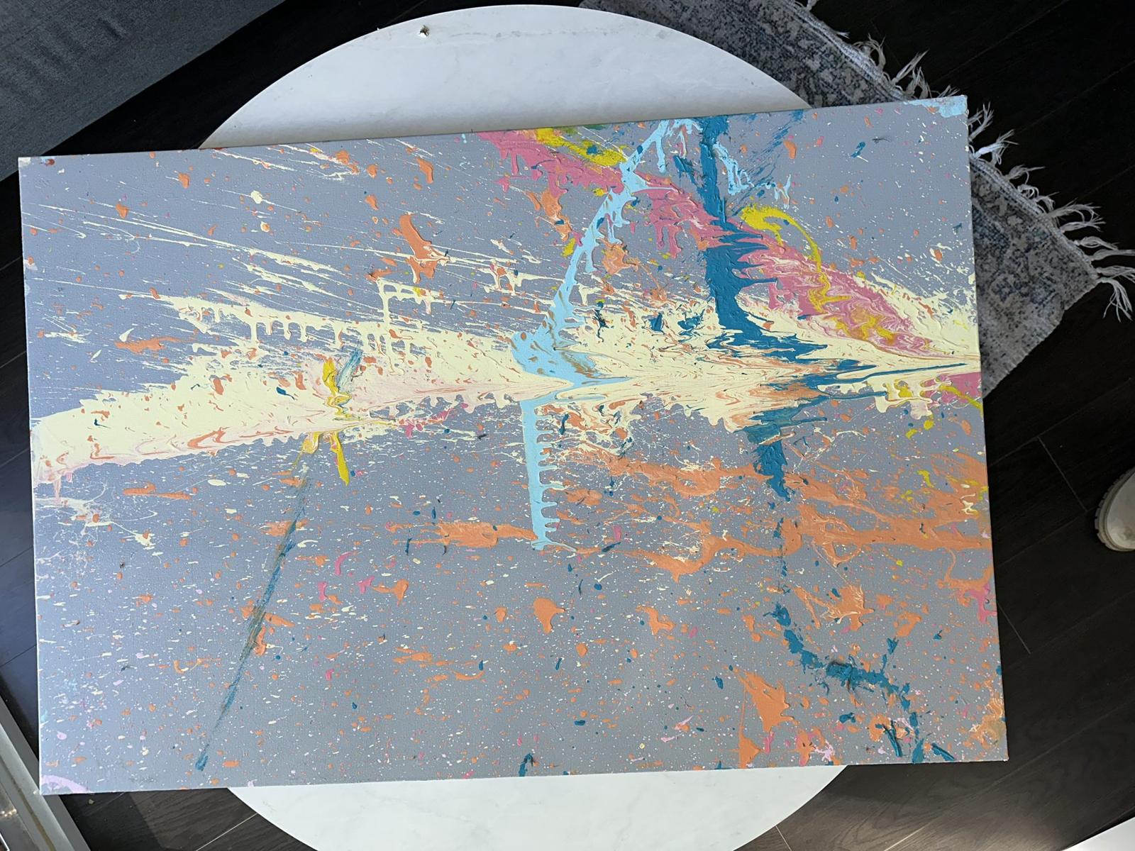 Milkshake No. 2 by Alejandro Sánchez: cream, yellow, pink and blue acrylic splatter across a horizontal grey canvas