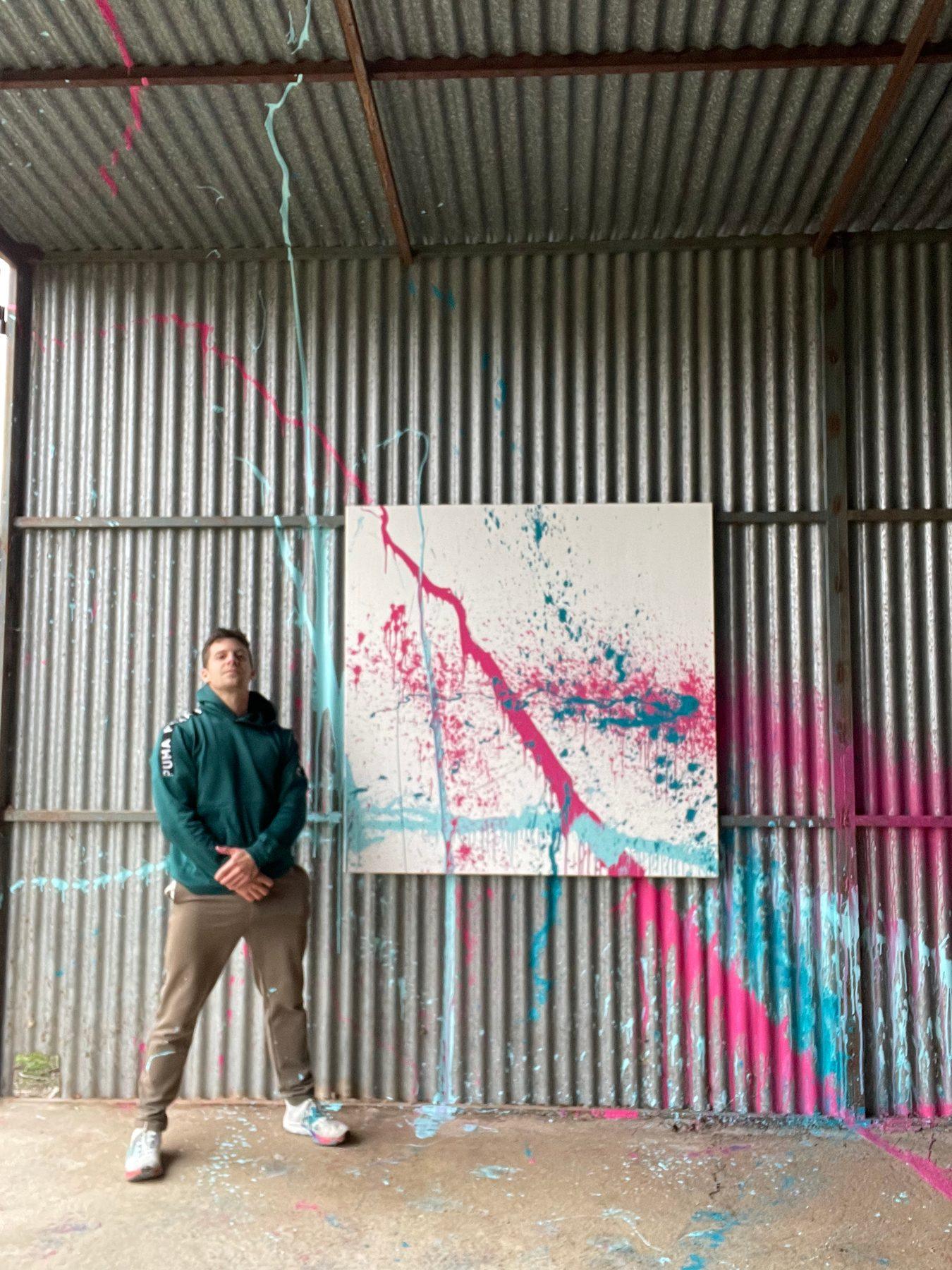 Alejandro Sánchez beside The Window inside the steel barn at his family's finca in Béjar, Spain